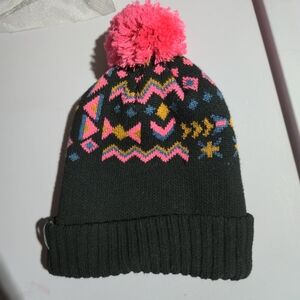 Patagonia Black Beanie with Hot Pink Pom and Multicolor Pattern